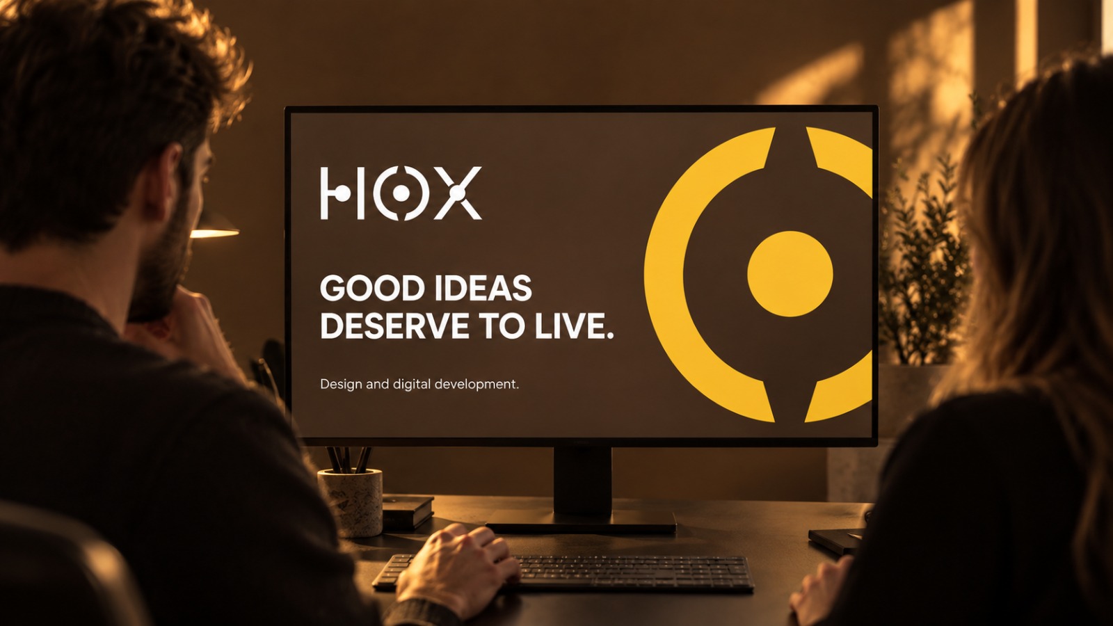 HOX Media logo on an office monitor